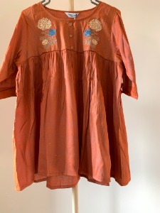 Embroidered peach tunic