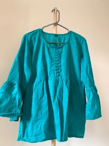 Top with bell sleeves