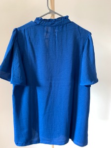 Top with bell sleeves