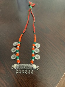 Orange and green necklace